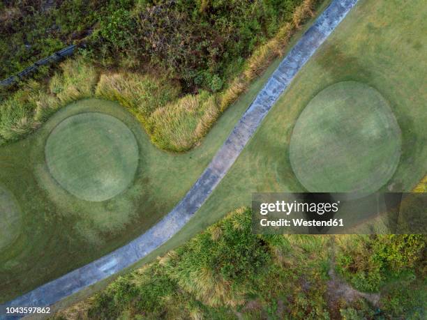 indonesia, bali, aerial view of golf course - bali golf stock pictures, royalty-free photos & images
