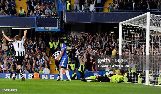 Newcastle's English striker Shola Ameobi celebrates scoring the fourth goal during their Carling Cup third round football match against Chelsea at...