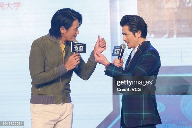 Actors Aaron Kwok Fu-shing and Chow Yun-fat attend the premiere of director Felix Chong Man-Keung's film 'Project Gutenberg' on September 24, 2018 in...