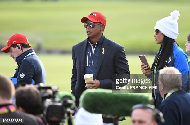 Golfer Tiger Woods reacts after Europe won the 42nd Ryder Cup at Le Golf National Course at Saint-Quentin-en-Yvelines, south-west of Paris, on...