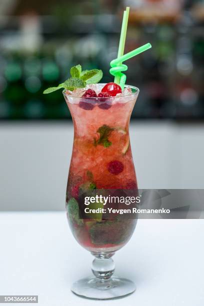 berry mojito in a glass with ice - raspberry cocktail stock pictures, royalty-free photos & images