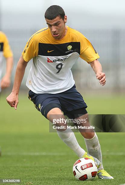 Eli Babalj of the Young Socceroos runs with the ball during the friendly match between the Young Socceroos and the Central Coast Mariners at...