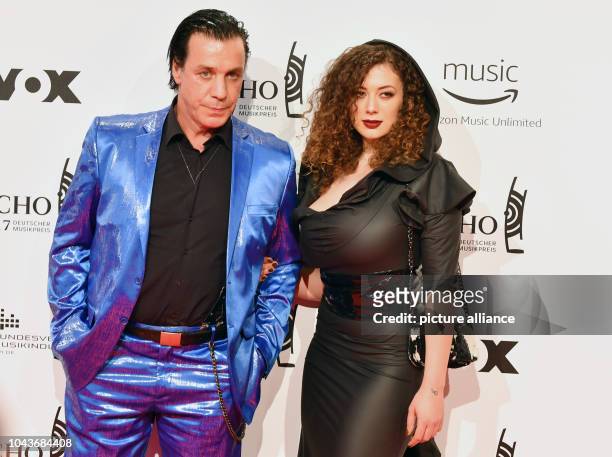 The singer of the band Rammstein, Till Lindemann, and partner Leila Lowfire arrive at the award ceremony of the 26th German music award 'Echo' in...