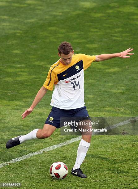 Daniel Bowles of the Young Socceroos passes the ball during the friendly match between the Young Socceroos and the Central Coast Mariners at...