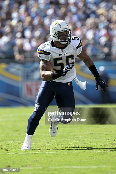 Linebacker Shawne Merriman of the San Diego Chargers comes off the line of scrimmage against the Jacksonville Jaguars at Qualcomm Stadium on...