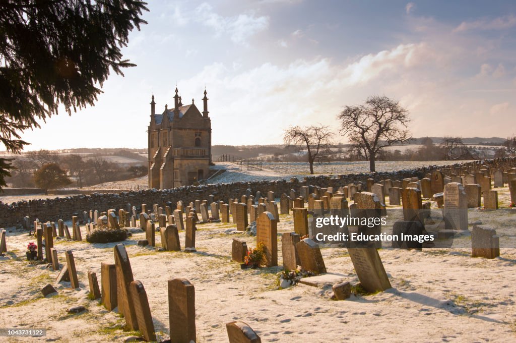 A thatched cottage covered in snow, Cotswold village of Chipping Campden England