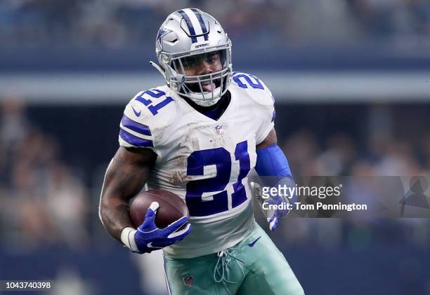 Ezekiel Elliott of the Dallas Cowboys scores a touchdown against the Detroit Lions in the second quarter at AT&T Stadium on September 30, 2018 in...