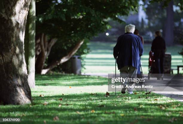 An elderly lady uses nordic walking sticks on September 23, 2010 in Berlin, Germany. Germany's elderly population is growing and its overall...