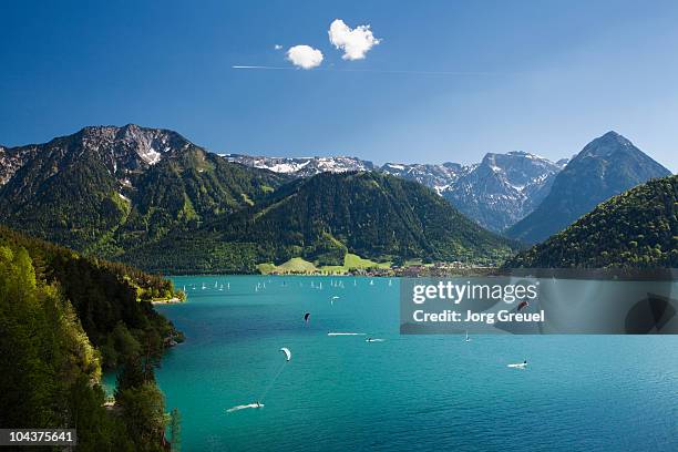 kite surfers on lake achensee - tyrol state stock pictures, royalty-free photos & images