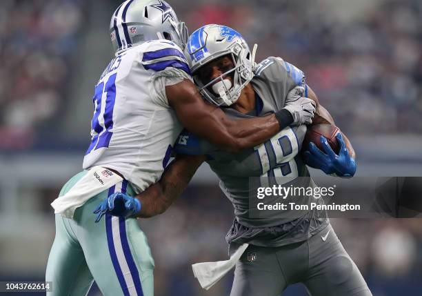 Byron Jones of the Dallas Cowboys hits Kenny Golladay of the Detroit Lions in the fourth quarter of a game at AT&T Stadium on September 30, 2018 in...