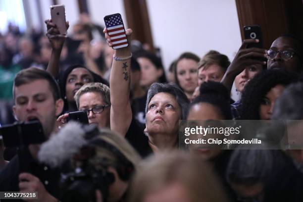 Hundreds of people protest against the confirmation of Judge Brett Kavanaugh outside the offices of Sen. Jeff Flake in the Russell Senate Office...
