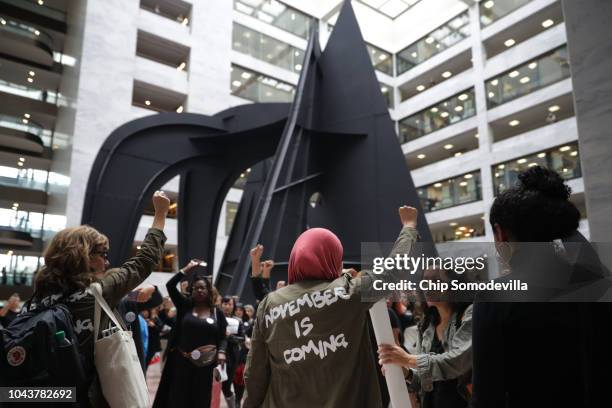 Hundreds of protesters rally in the Hart Senate Office Building while demonstrating against the confirmation of Supreme Court nominee Judge Brett...