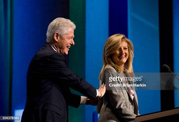 Former U.S. President Bill Clinton and Arianna Huffington announce the start of the final day of the annual Clinton Global Initiative meetings...