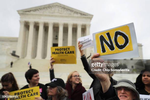 Protesters rally in front of the Supreme Court while demonstrating against the confirmation of Judge Brett Kavanaugh to the court September 24, 2018...