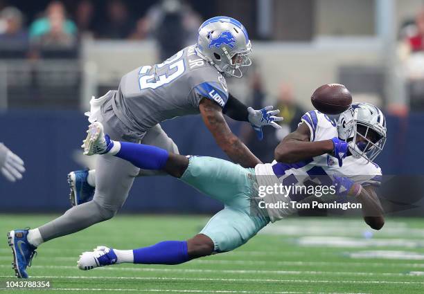 Darius Slay of the Detroit Lions breaks up a pass intended for Michael Gallup of the Dallas Cowboys in the fourth quarter of a game at AT&T Stadium...