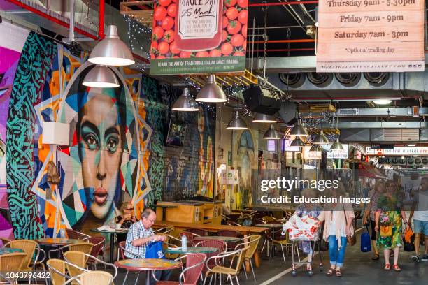 Murals painted on walls at cafe in Central Market, Adelaide, South Australia.