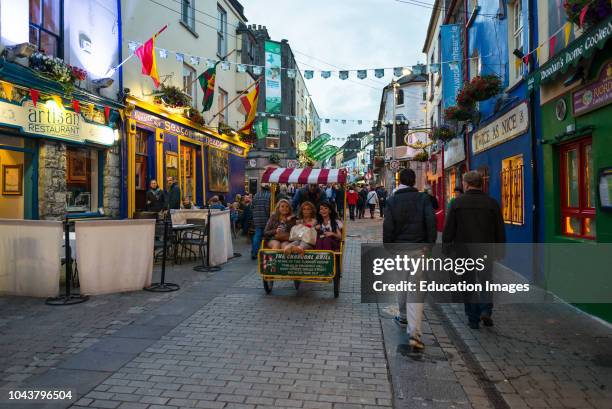 Latin quarter shops at dusk in Galway City center County Galway, Ireland.