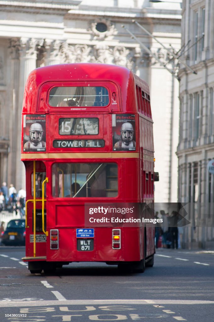Red double decker Routemaster bus rear view, seen outside St Pauls Cathedral, London, England