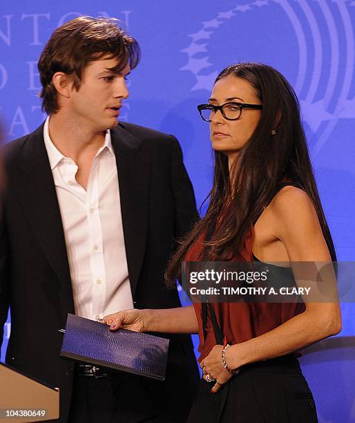 Actors Ashton Kutcher and Demi Moore, co-founders of the DNA Foundation, launch the "Real Men Don't Buy Girls" campaign during the annual Clinton...