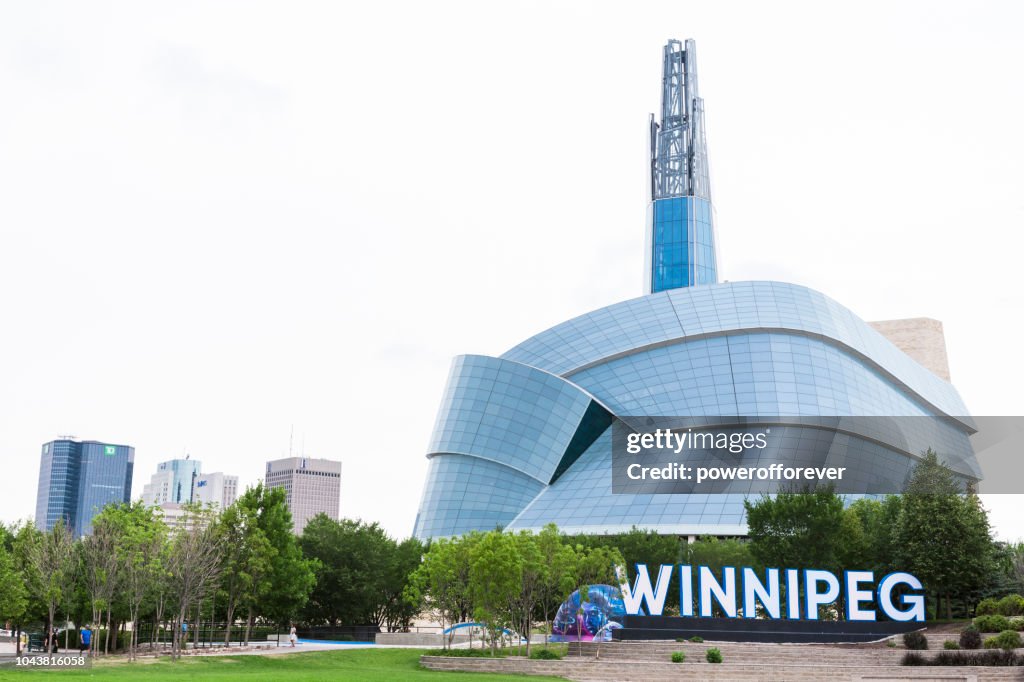 City Sign and Canadian Museum of Human Rights in Winnipeg, Manitoba, Canada