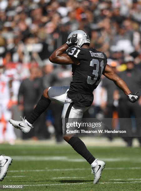 Marcus Gilchrist of the Oakland Raiders celebrates after the Raiders defense stopped the Cleveland Browns on third down and short in the first quater...