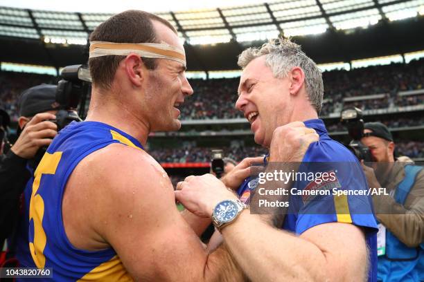 Adam Simpson, Senior Coach of the Eagles celebrates winning the Premiership with Eagles captain Shannon Hurn during the 2018 Toyota AFL Grand Final...