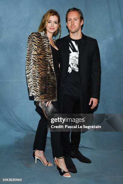 Anne Hathaway and Adam Shulman attend the Givenchy show as part of the Paris Fashion Week Womenswear Spring/Summer 2019 on September 30, 2018 in...