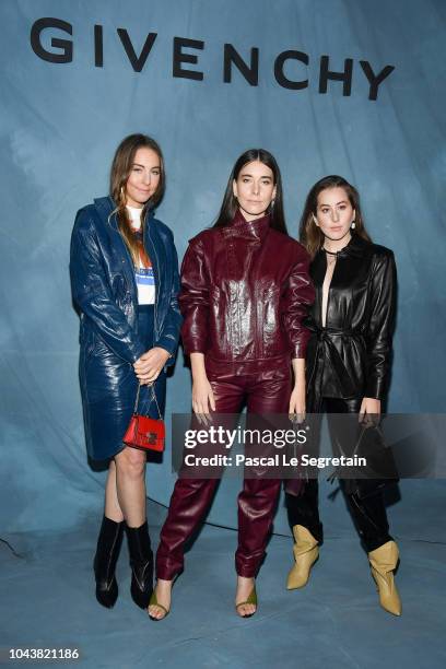 Danielle Haim, Este Haim and Alana Haim from the band HAIM attend the Givenchy show as part of the Paris Fashion Week Womenswear Spring/Summer 2019...