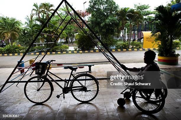 Land mine victim who asked to stay anonymous has a solitary moment at the VI in Phnom Penh, January 30, 2008. Veterans International was launched in...