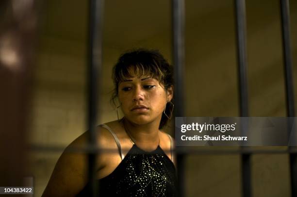 Year-old drug seller "La Leona," Lorena Janet Hernandez Herrera, sits in a detention cell at PEP Police station in Tijuana, Baja California, Mexico...