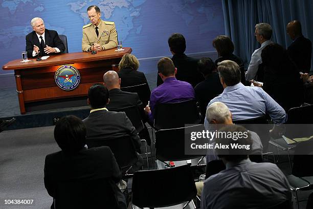 Secretary of Defense Robert Gates and Chairman of the Joint Chiefs of Staff Adm. Mike Mullen answer questions from the media during a press briefing...