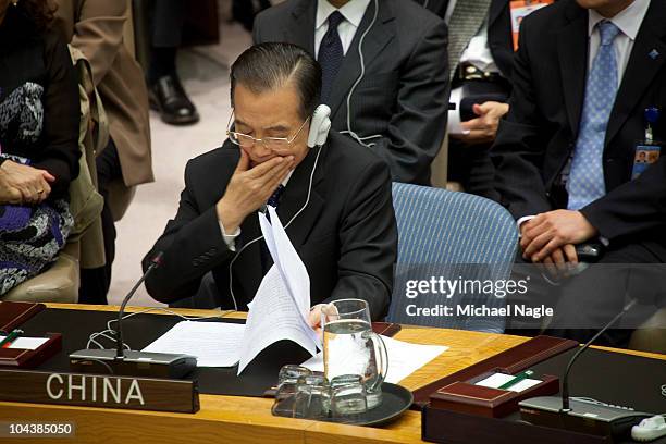 Chinese Premier Wen Jiao Bao prepares to speak at a Security Council meeting on the maintenance of international peace and security at the United...