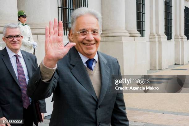 Former President of Brazil Fernando Henrique Cardoso gestures after a meeting with President of Chile Sebastián Piñera at Palacio de La Moneda on...