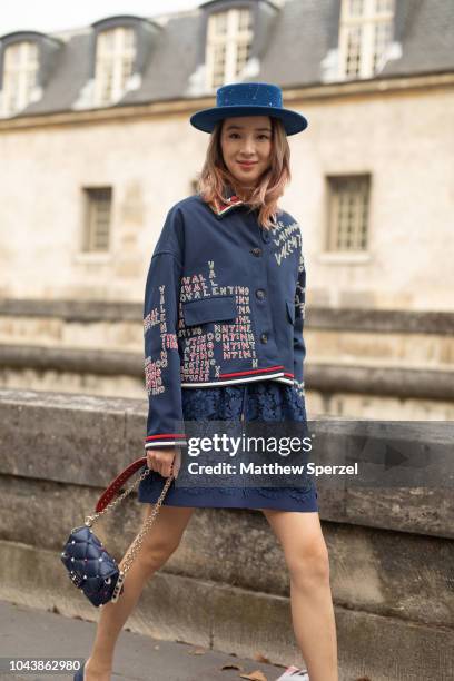Irene Kim is seen on the street during Paris Fashion Week SS19 wearing Valentino on September 30, 2018 in Paris, France.