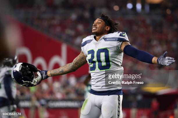 Defensive back Bradley McDougald of the Seattle Seahawks reacts after Arizona Cardinals kicker Phil Dawson · missed a field goal during the fourth...