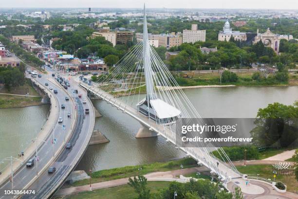 esplanade riel bridge in winnipeg, manitoba, canada - manitoba stock pictures, royalty-free photos & images