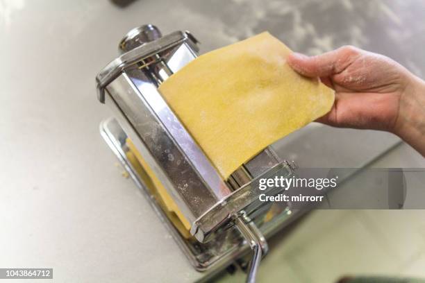 chef preparing handmade stuffed pasta tortellini - ombelico stock pictures, royalty-free photos & images