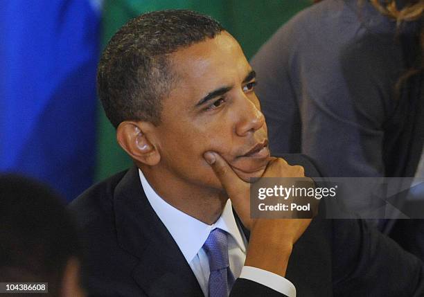 President Barack Obama attends a luncheon hosted by UN Secretary General Ban Ki-moon at UN headquarters September 23, 2010 in New York City. The...