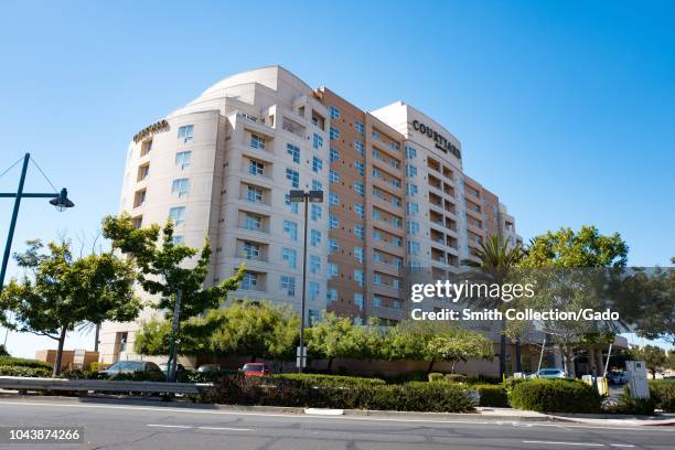 Low-angle view of Courtyard Marriott hotel in Emeryville, California, a popular option for travelers to San Francisco, September 18, 2018.