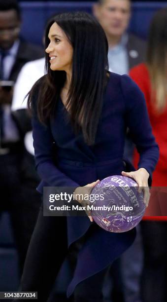 Meghan, Duchess of Sussex takes part in a netball game as she attends the Coach Core Awards held at Loughborough University on September 24, 2018 in...