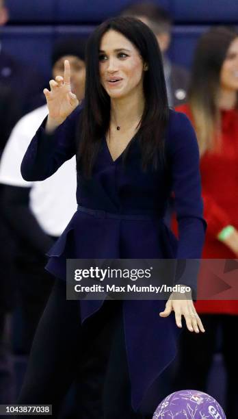 Meghan, Duchess of Sussex takes part in a netball game as she attends the Coach Core Awards held at Loughborough University on September 24, 2018 in...