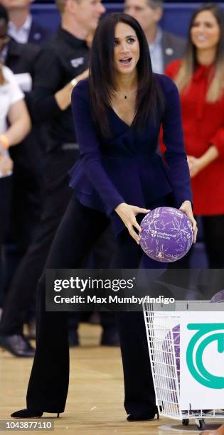 Meghan, Duchess of Sussex takes part in a netball game as she attends the Coach Core Awards held at Loughborough University on September 24, 2018 in...