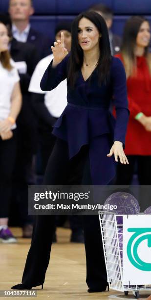 Meghan, Duchess of Sussex takes part in a netball game as she attends the Coach Core Awards held at Loughborough University on September 24, 2018 in...