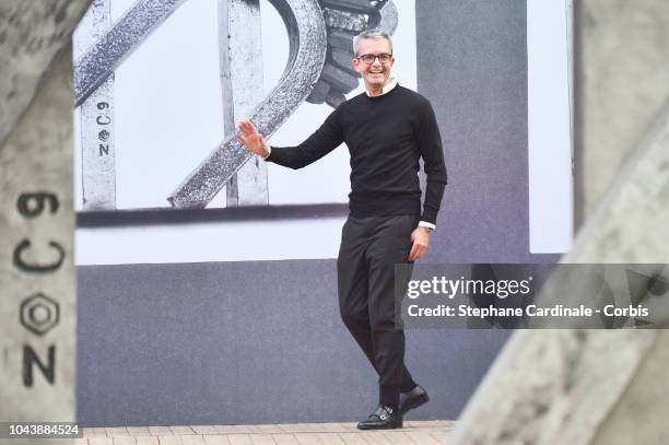 Fashion designer Albert Kriemler walks the runway during the Akris show as part of the Paris Fashion Week Womenswear Spring/Summer 2019 on September...