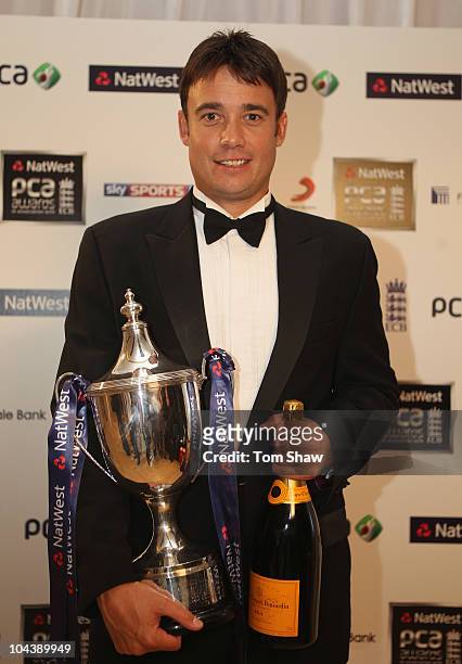 Neil Carter of Warwickshire with the Reg Hayter Cup for the NatWest PCA Player of the Year during PCA Awards dinner at the Hurlingham Club on...