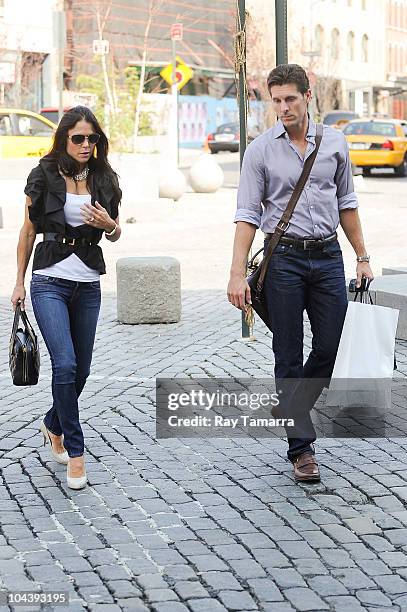 Personalities Bethenny Frankel and Jason Hoppy walk in the Meatpacking District on September 23, 2010 in New York City.