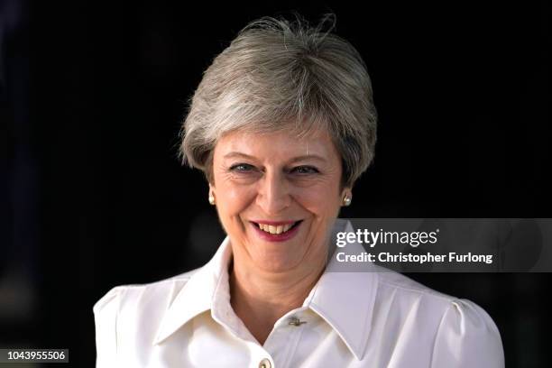 British Prime Minister Theresa May attends day two of the annual Conservative Party Conference on October 1, 2018 in Birmingham, England. This year...