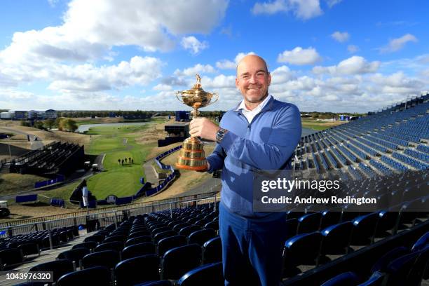 Captain Thomas Bjorn of Europe pose for a photo with The Ryder Cup during a press conference following Europe's win in the 2018 Ryder Cup at Le Golf...