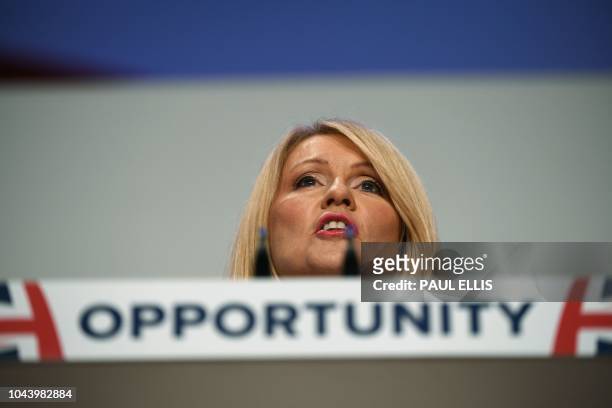 Britain's Work and Pensions Secretary Esther McVey gives a speech in the main hall on the second day of the Conservative Party Conference 2018 at the...