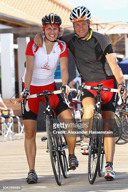 Biathlon Olympic champion Kati Wilhelm rides racing cycle with Andreas Emslander during the 'Champion des Jahres' event week at the Robinson Club...